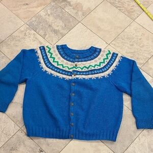 Women's blue patterned cardigan.